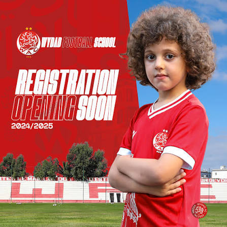 A young child in a Wydad Football School red shirt — registration for the 2024/2025 season